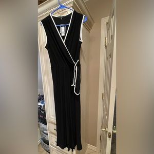 Nik and Nash jumpsuit. Black with white trim. Medium